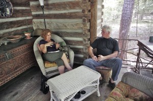 Penelope Maunsell and Patrick Dougherty on Dougherty's porch. Photo by Frank Konhaus