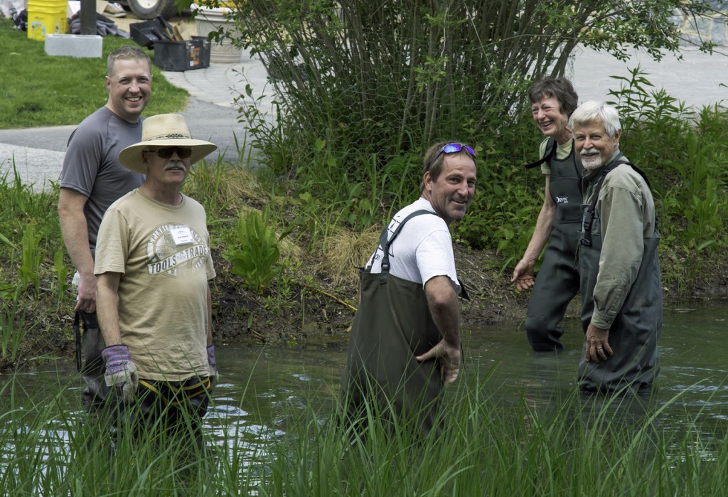 Garden staff and volunteers await delivery of the island.