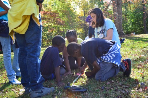 Kids measuring and taking scientific data