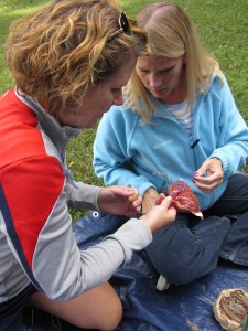 Epiphany Preschool teachers stitching together nesting bags. Teamwork!