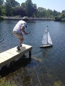 Remote-controlled model boats on Sydnor Lake on Father's Day