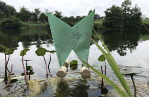 cork, toothpick and paper boat