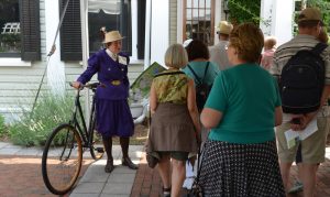 Garden volunteer Sherry Geise talking to visitors taking the group tour From Bicycle Club to Botanical Garden