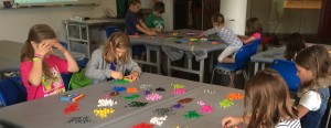 Kids building LEGO mosaics