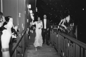 Couple making their grand exit from the Robins Tea House. Image by Andrew & Tianna Photography.