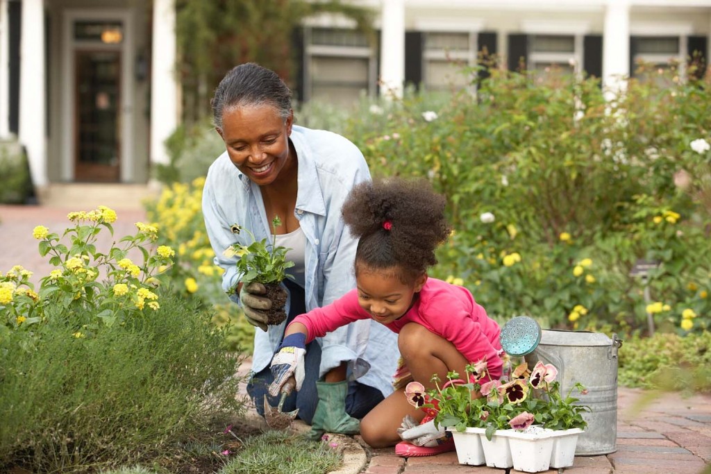 While gardening together, a child's enthusiasm can serve as therapeutic horticulture for the accompanying adult.