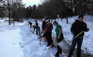hort staff shoveling snow
