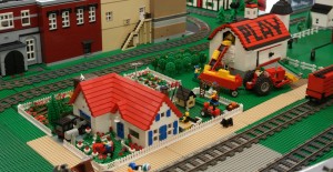 A train display incorporating LEGO Bricks. Farm photo is courtesy of Constantine Hannaher