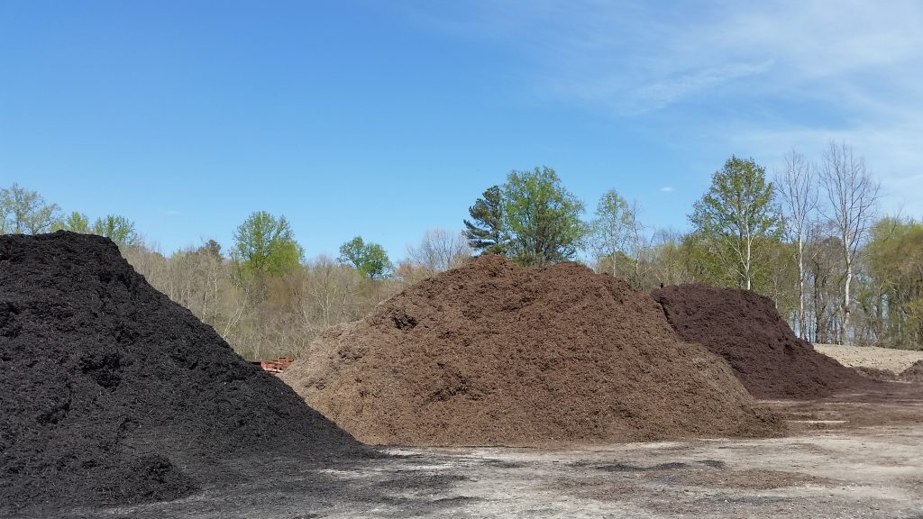 Black-dyed, natural and brown-dyed mulch appear different but their benefits are the same. Mulching is good for your plants.