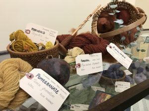 Part of the spinning demonstration is a colorful display of natural fibers colored with natural dyes, from pomegranate to eucalyptus.