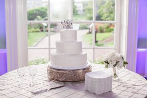 Wedding cake overlooks Central Garden. Image by Caroline Martin Photography.