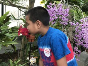 Brayden from World Pediatric Project touring the Garden