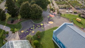 Emily Herr mural in the Kroger Community Kitchen Garden. via a drone. Image by Harlow Chandler