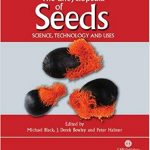 Book cover of the Encyclopedia of Seeds; three large brown seeds are shown in front of a gray and red background