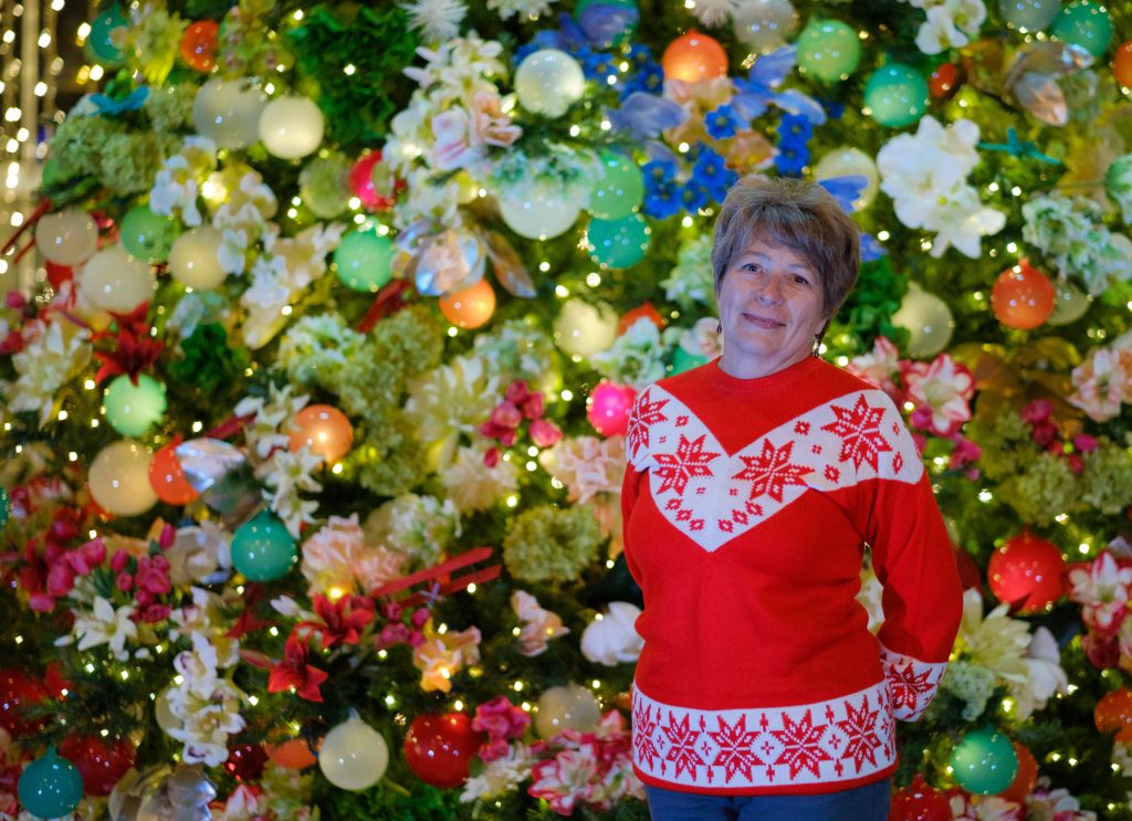 Irina Neverova volunteers in the greenhouse