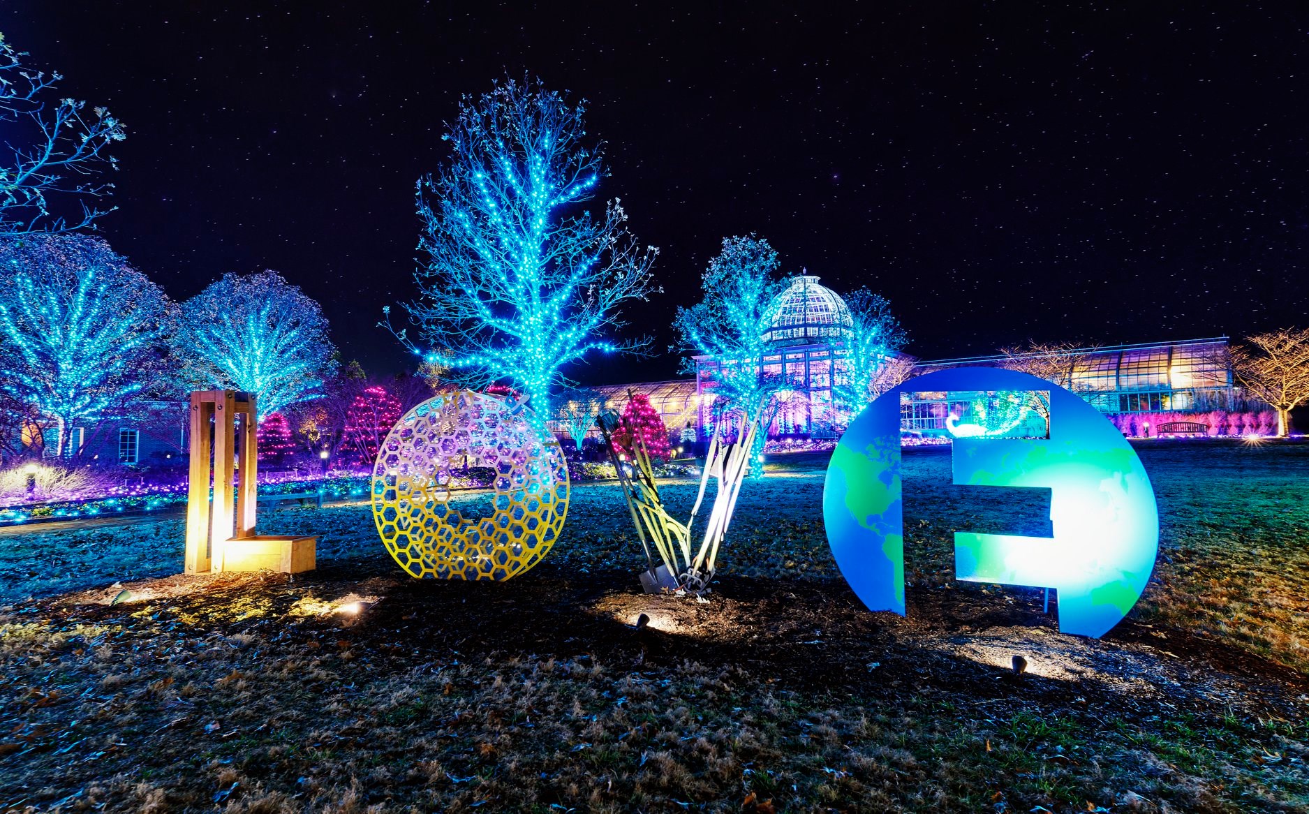 LOVE works lit at night for GardenFest. If you LOVE Lewis Ginter Botanical Garden donate to support our mission. Image by James Loving