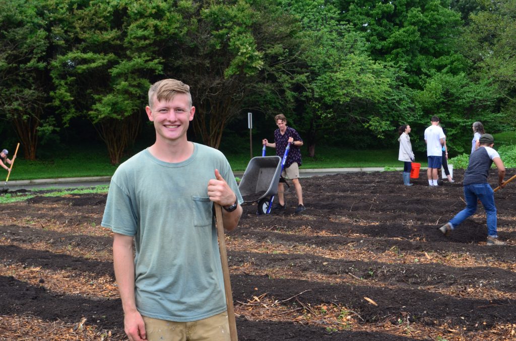 Sustainable Agriculture Gardener Conor Collins in the Community Kitchen Garden