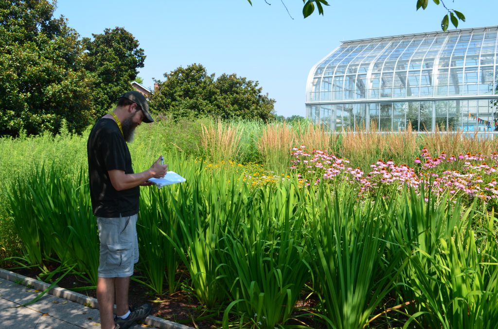 Nicholas Ruppel at Lewis Ginter Botanical Garden recording notes