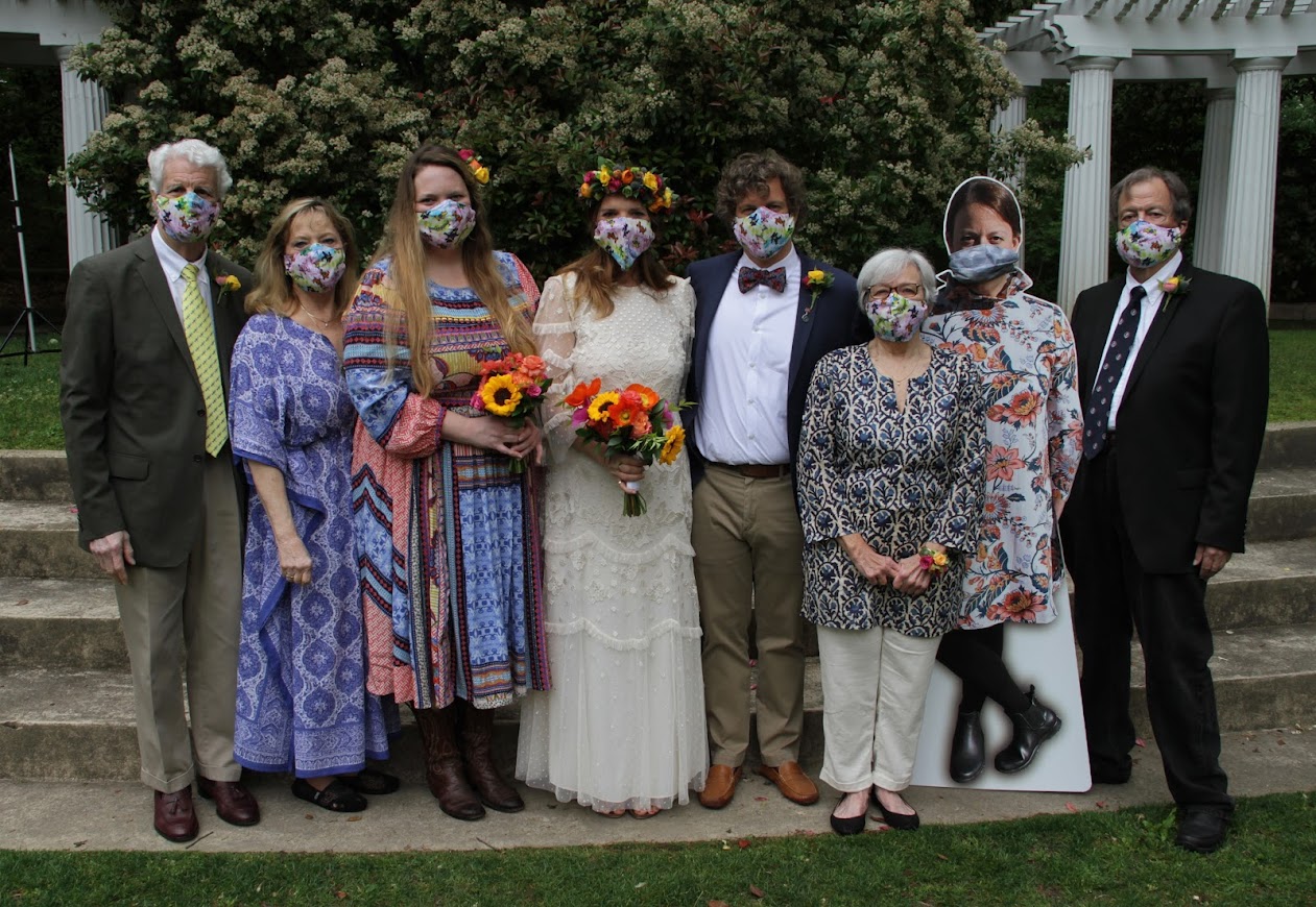 Reflections of A masked wedding party during COVID