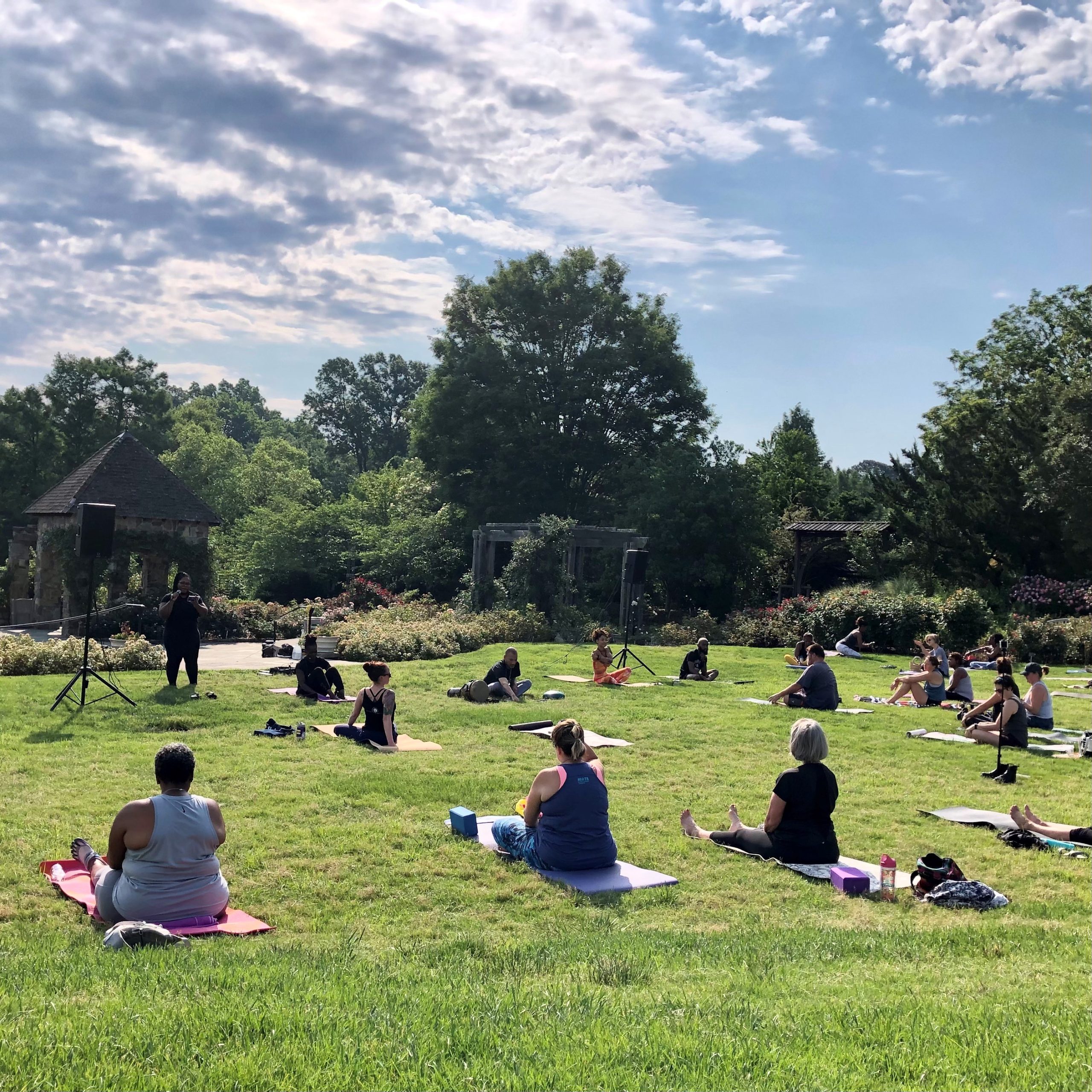 Project Yoga Richmond in the Cochrane Rose Garden on Juneteenth.