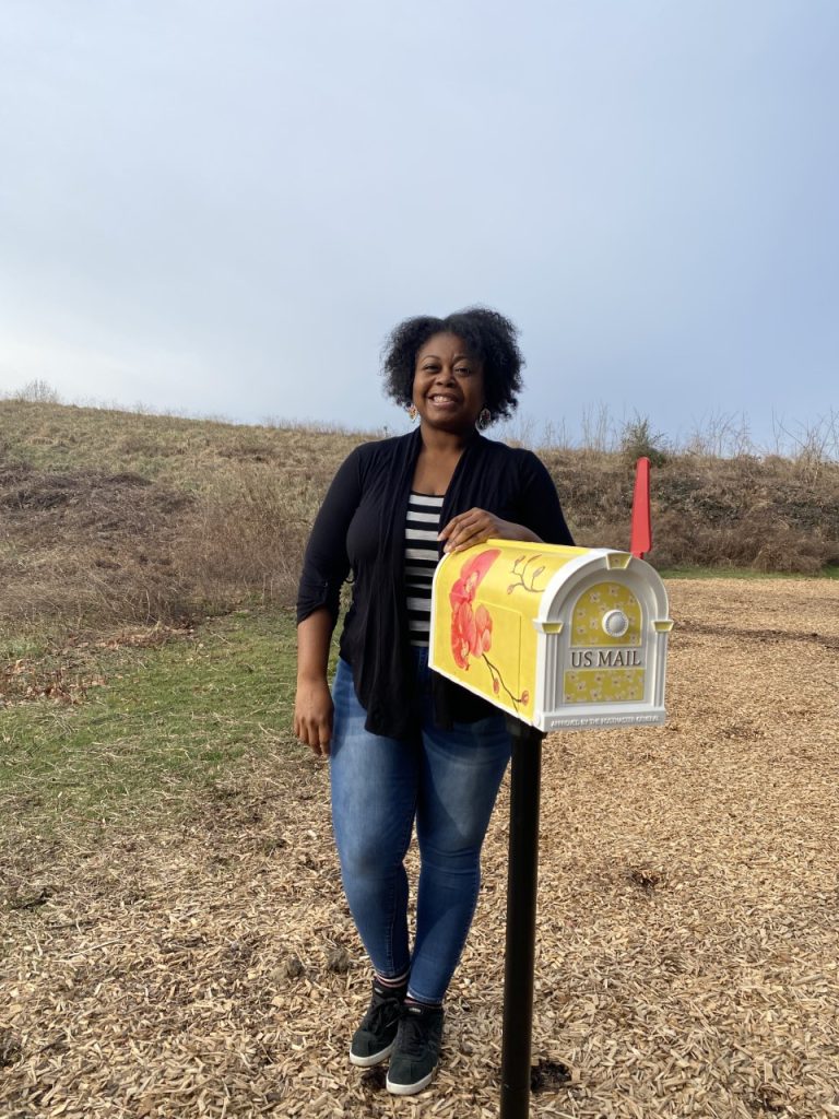 Unicia Buster is one of several local artists who designed mailboxes for love letters to nature