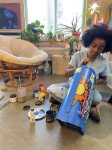 Local artists, including Jowarnise Caston, painted mailboxes at Lewis Ginter