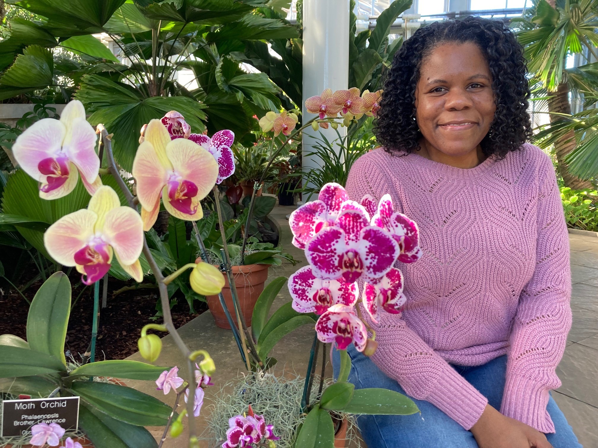 Leanne Wingo with a Phalaenopsis orchid