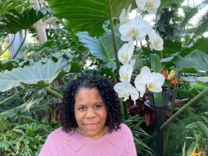 Leanne Wingo with a Phalaenopsis orchid