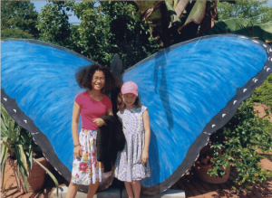 Sasha and Evelyn in front of the blue butterfly